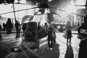 Helicopter, military, war, woman, child, night.