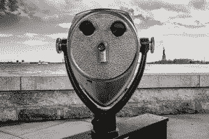 Statue of Liberty, binoculars, telescope, face, distance, bay, water.